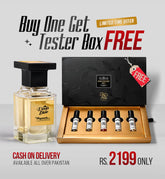 Promotional product image for a fragrance tester box offer. A clear glass perfume bottle and open black presentation box containing four small samples in a gold tray.