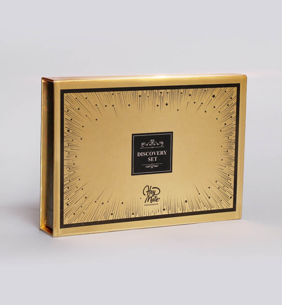 Gold packaging box with decorative design and 'HeyMate' branding on a white background