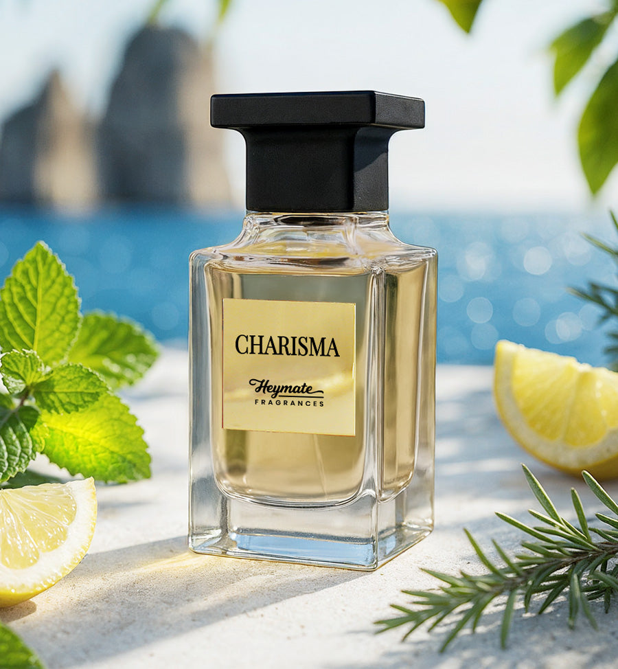 Perfume bottle labeled 'Charisma' with lemons and mint leaves on a bright background