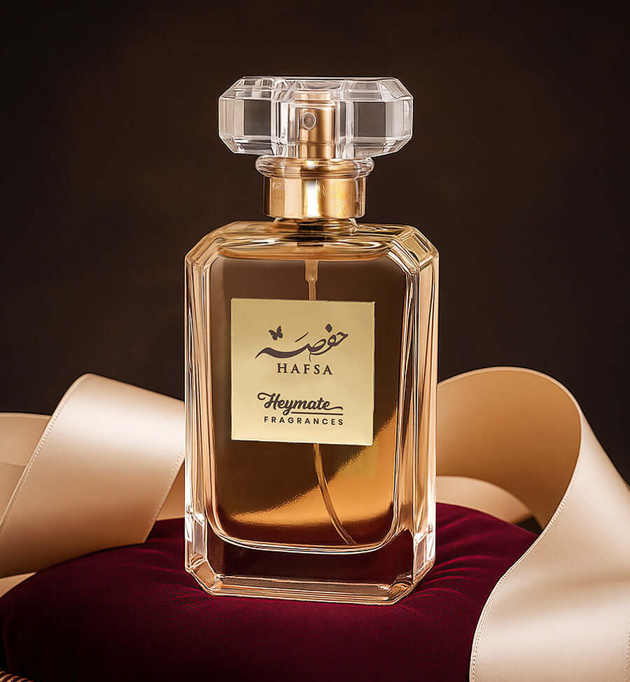 Perfume bottle with 'Hafsa' label on a dark background