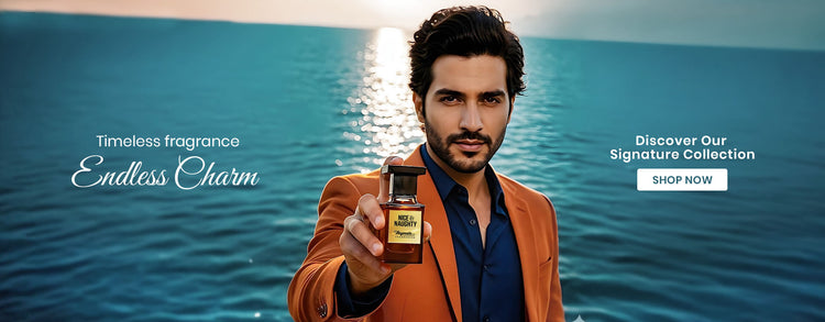 Man holding a perfume bottle with ocean background and signature perfumes text.