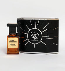 Oud Supreme perfume bottle with Hey Mate Fragrances packaging on a white background