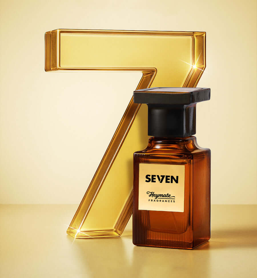 Brown perfume bottle labeled 'Seven' with a large gold number '7' on a beige background
