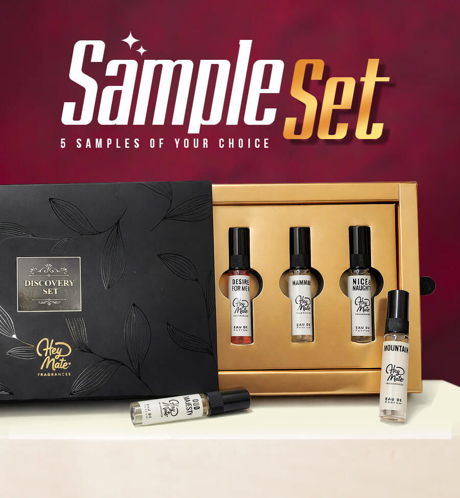 Set of perfume samples with a black and gold box on a red background, featuring 'Sample Set' branding.