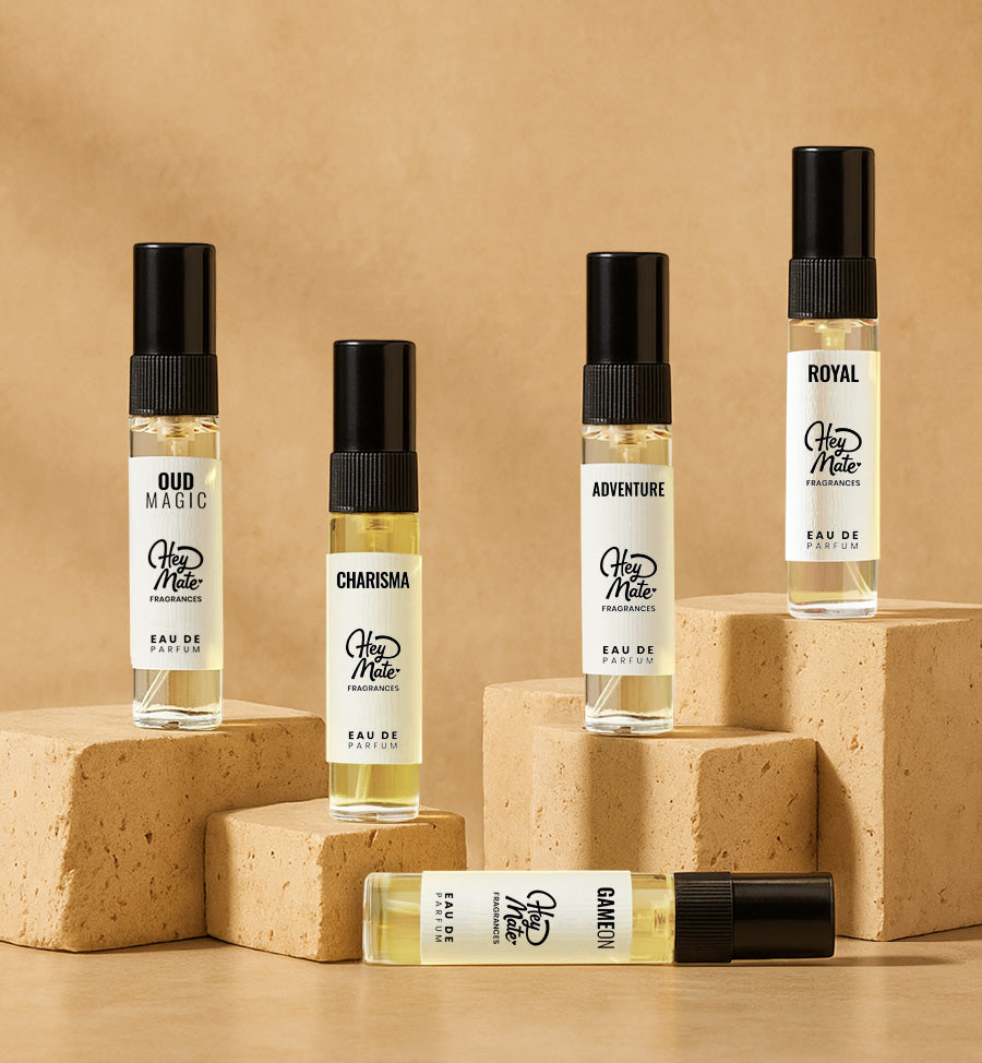 Set of perfume bottles with labels on a beige background