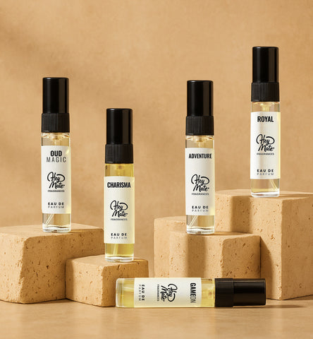 Set of perfume bottles with labels on a beige background